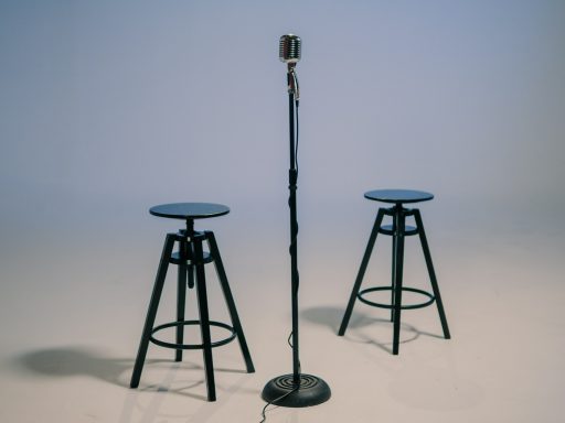 black and gray tripod stand